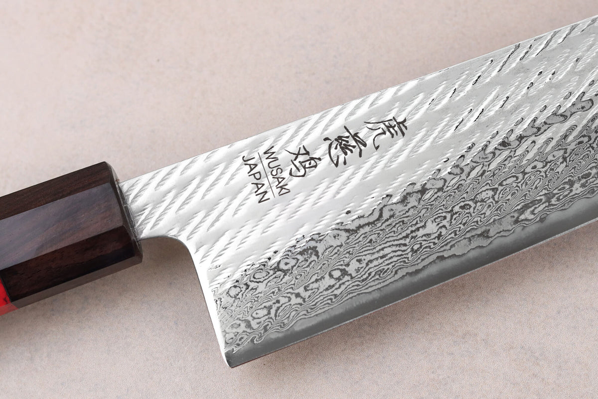 Couteau de chef 24cm japonais artisanal Nawame Ébène AUS10 damas