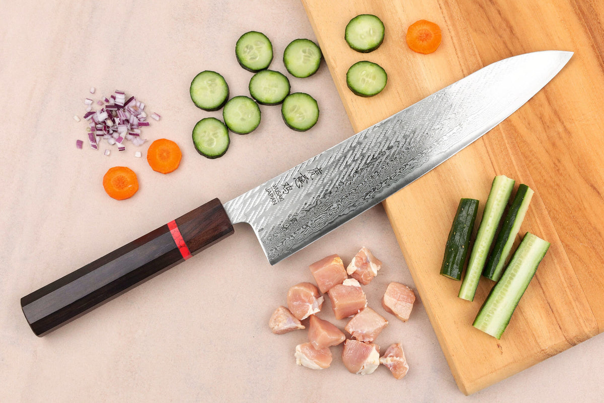 Couteau de chef 24cm japonais artisanal Nawame Ébène AUS10 damas
